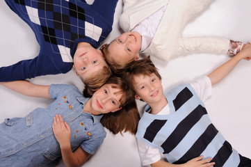 children lying on the floor