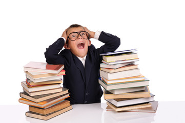 Schoolboy screaming near the huge stack of books