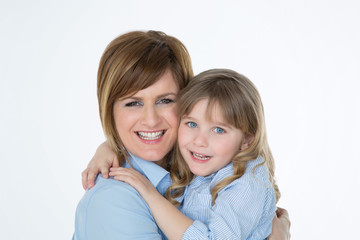 portrait of smiling female couple on white background