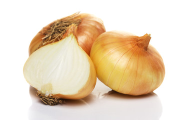 Fresh onion bulbs isolated on white background
