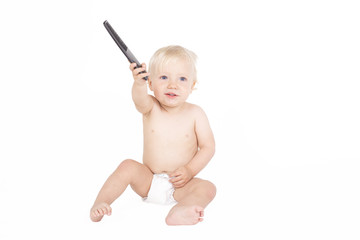 One year old boy with comb