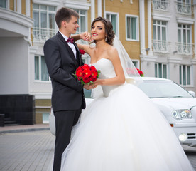 Newlyweds near the house