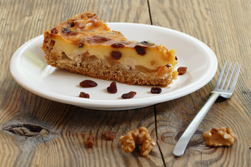 piece of cake on a rustic wooden board