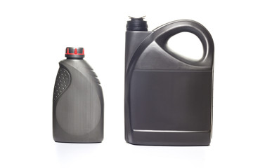 Gray canister with engine oil isolated on white background
