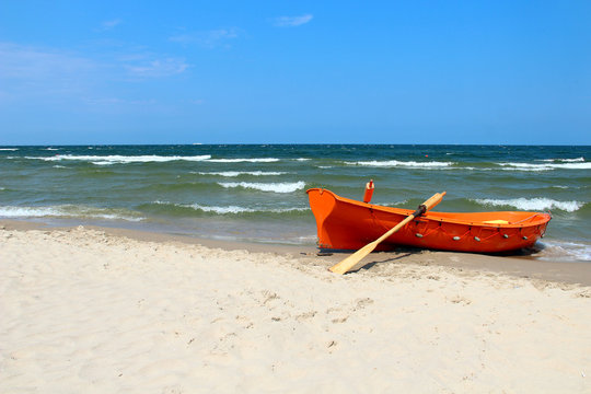 Fototapeta Boat on the beach of Baltic sea