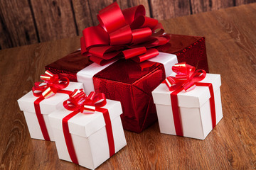 one red gift box white gift boxes