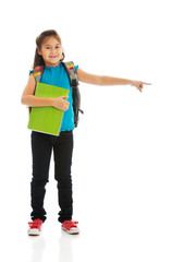 Little girl holding notebooks