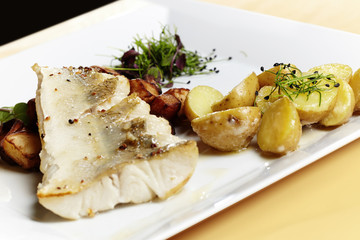 Grilled zander fillet  served with fresh potatoes