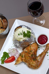 Chicken, potatoe and cream, glass of red wine