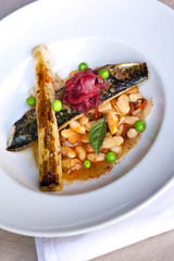 Mackerel fillet, roasted leeks and beans