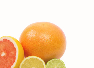 Image of a fresh whole lime, lemon and orange isolated on white