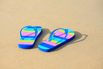 Fototapeta na wymiar slippers on the beach