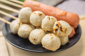 The grilled sausage and meat ball in Thai style