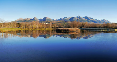 Autumn mountains with reflection in lake