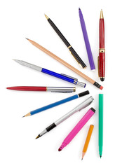 pens and pencils on white