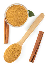 cinnamon sticks and powder on white