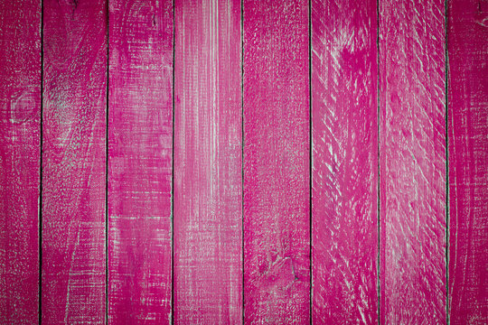 Fototapeta Close up pink wooden background
