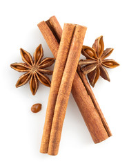cinnamon sticks and anise star on white