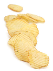 Spicy potato chips isolated on white background
