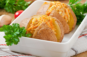 Baked potatoes stuffed with minced chicken and carrots