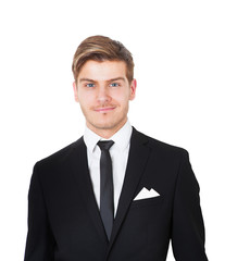 Smiling Businessman Against White Background