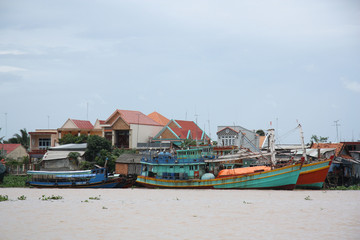 Fototapeta na wymiar Fishing boats at the berth, Mekong Delta, Vietnam