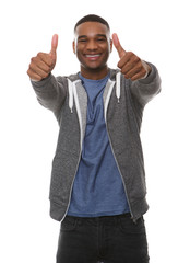 Fototapeta premium Happy young man with thumbs up gesture
