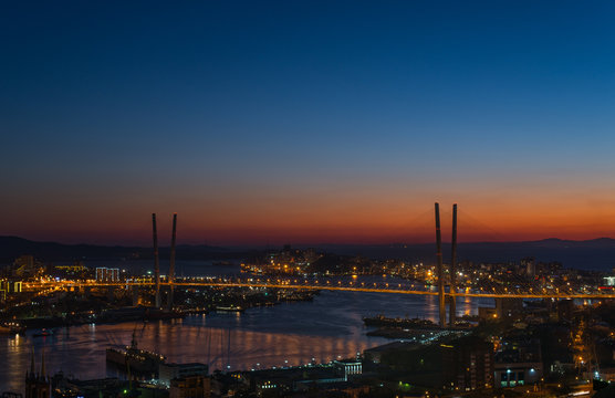 Vladivostok cityscape, sunset with a few stars in the sky.