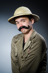 Man in safari hat in hunting concept