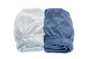 Pile of male underwear on  white background.