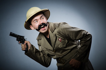 Fototapeta premium Man in safari hat in hunting concept