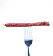 sausage on a fork