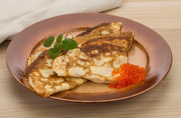 Pancakes with red caviar