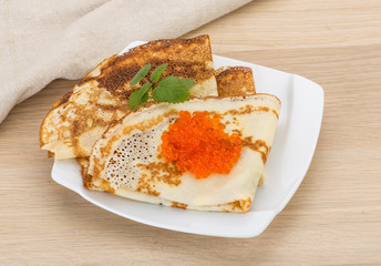 Pancakes with red caviar
