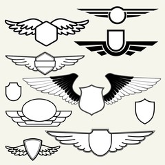 Insignias or Logotypes with wings set on white background.