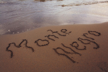 beach sand summer inscription on the sand