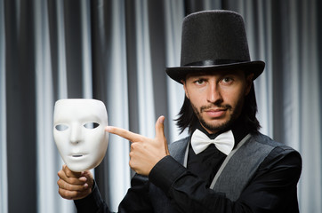 Funny concept with theatrical mask