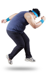 Full length of fat man exercising 2