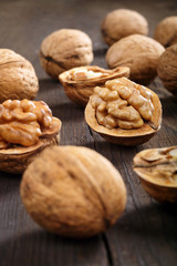 Walnuts on a wooden background