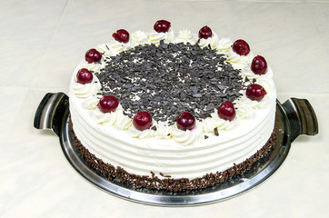 Cream cake with cherries