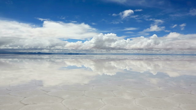 Panorama of the reflecting surface of the lake Salar de Uyuni