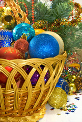 different Christmas decorations in basket
