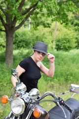 Stylish girl on a bike