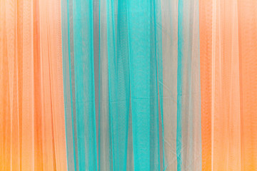 Close up of curtain blue and orange.Can be used as background