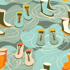 Obraz premium Rain boots in a puddle