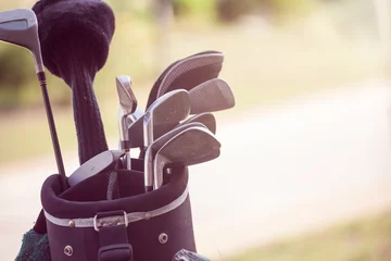 Fotobehang set of golf clubs © dechevm