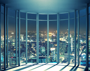 Fototapeta na wymiar Night view of buildings from high rise window