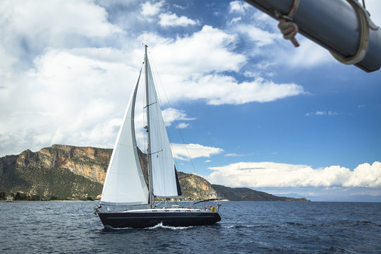 Boat in sailing regatta. Luxury yachts at the Sea.