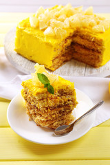 Tasty lemon dessert on wooden table