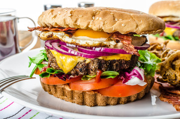 Beef burger, red onion and fried egg